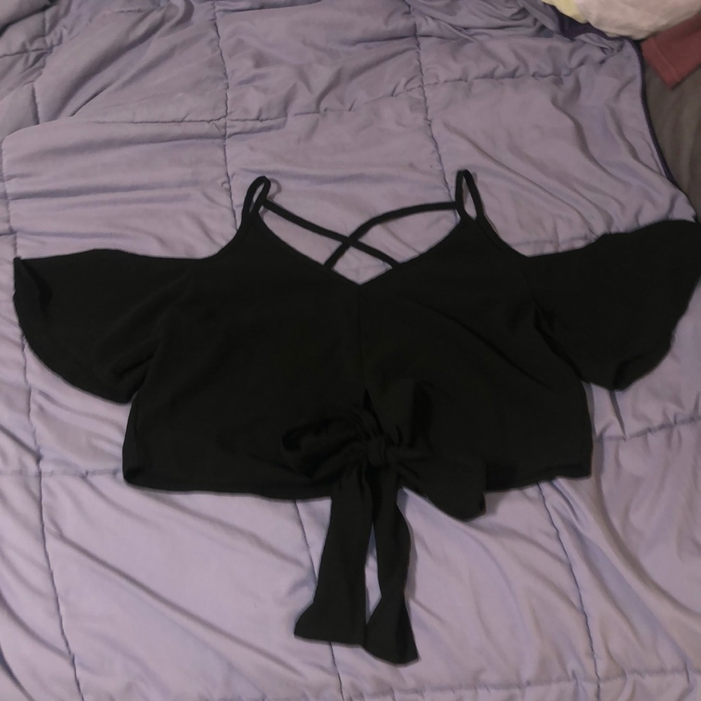 Black V neck cross tie shirt with a knot tie at the bottom